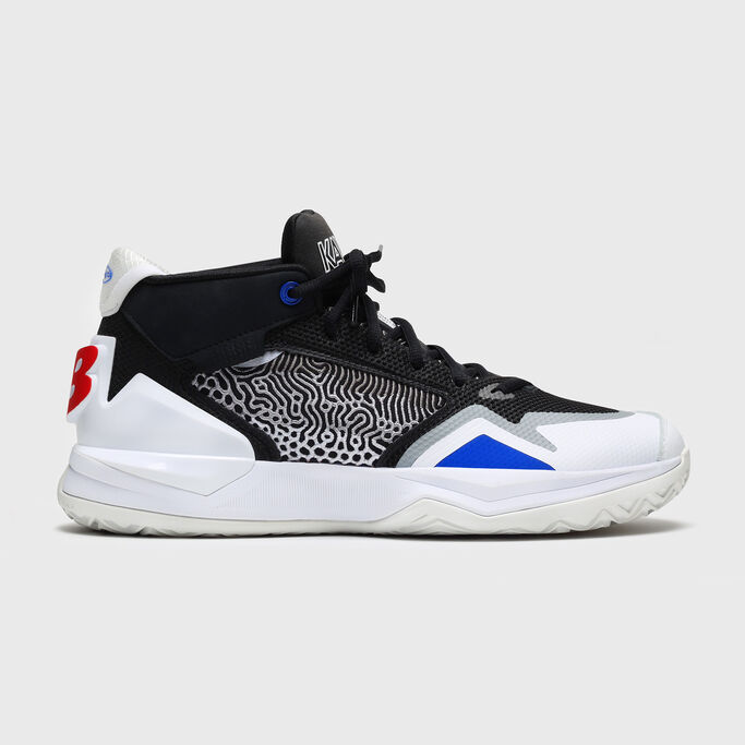 Lateral side of the right shoe.