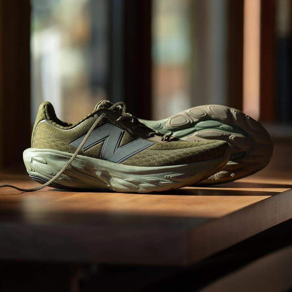 A pair of green 1080v14 shoes.