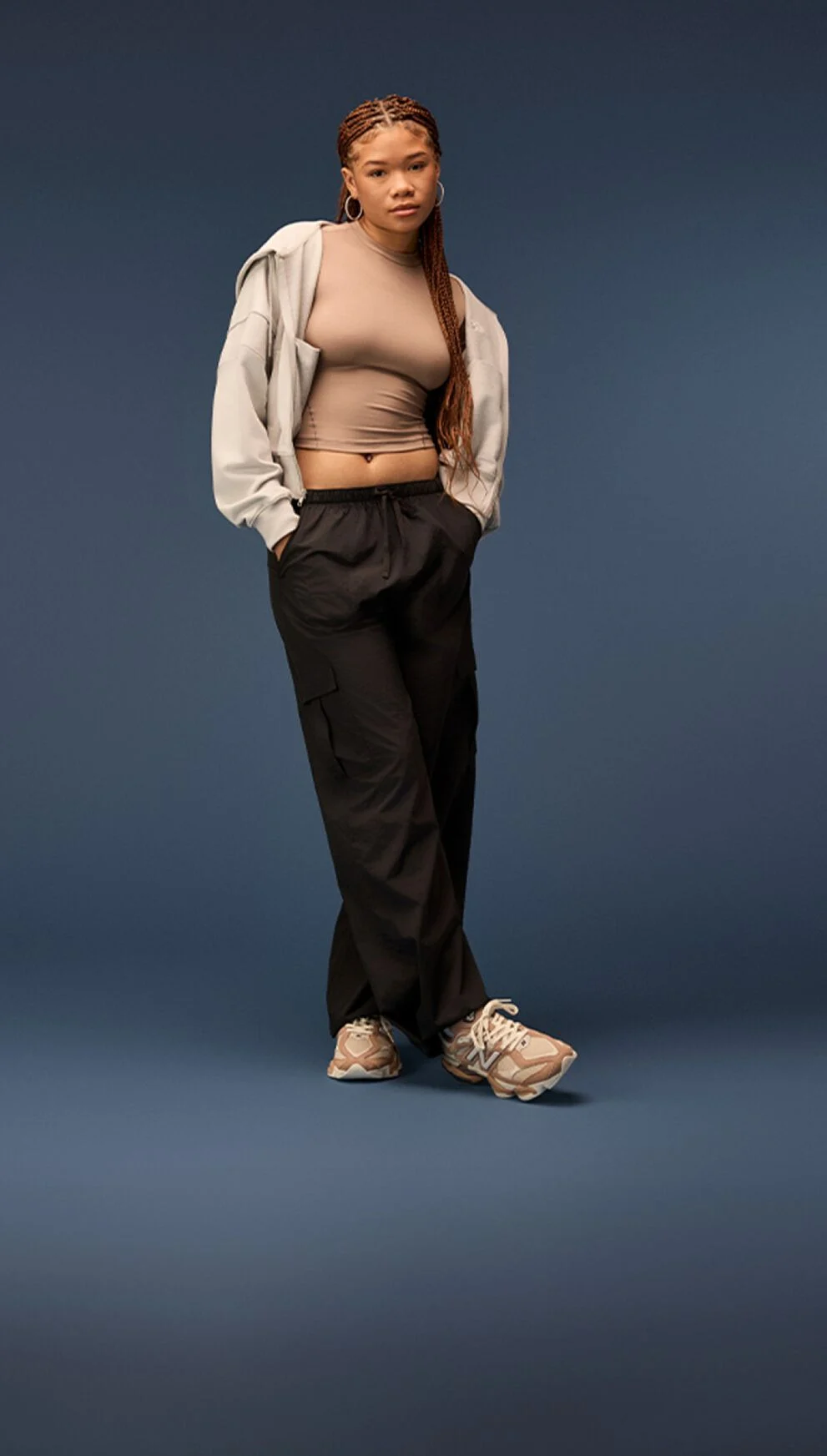 Storm Reid wearing the 9060 Earth Shadow