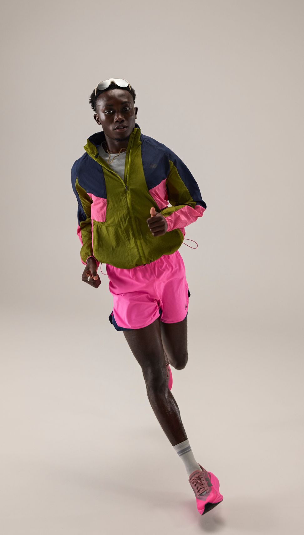 Tinoda Matsatsa running and wearing RC apparel. 