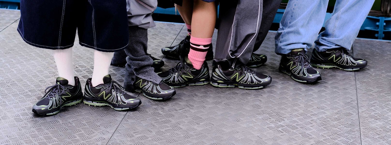 Multiple on-figure knee down shots wearing the lime green and black shoes.