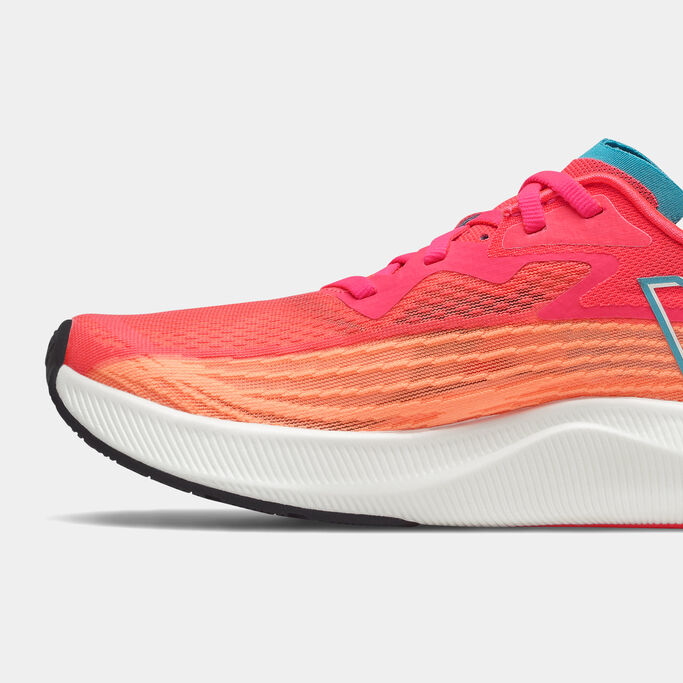 Cropped view of the side of a women’s NB FuelCell Rebel v2 running shoe