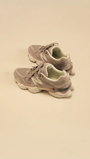 Off-figure shot of tan and beige shoes  