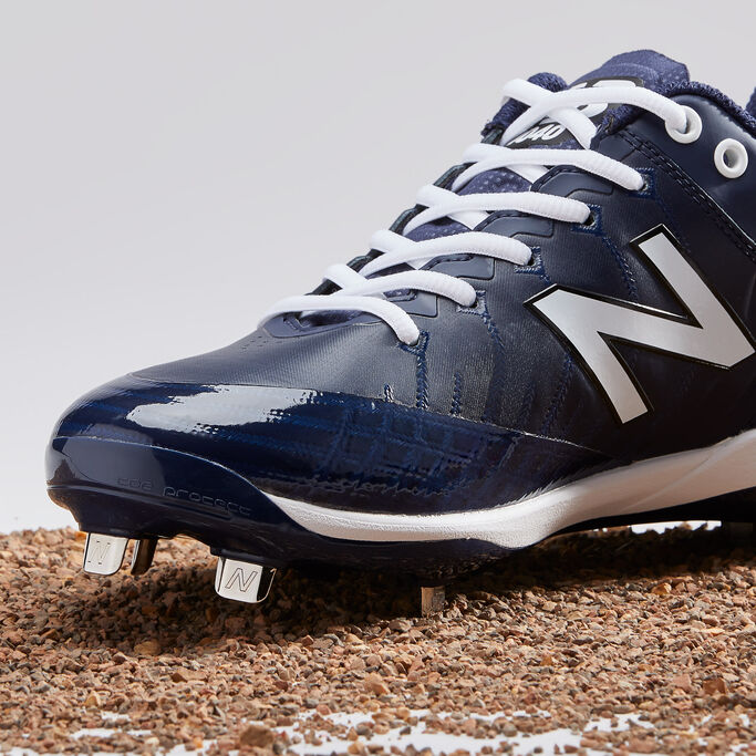 Front close up of blue 4040v5 Metal cleat on gravel