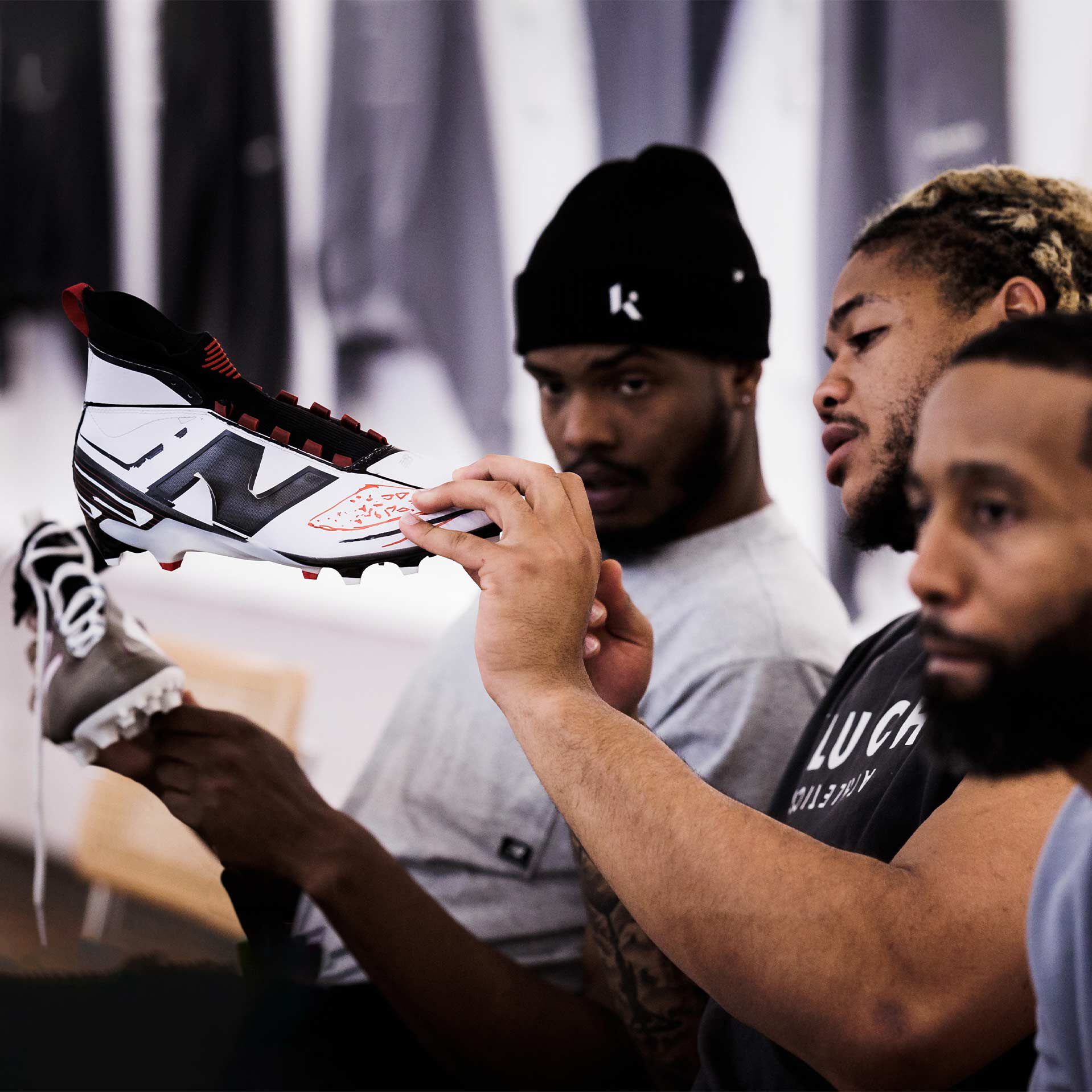 Chase Young admiring NB Cleat.
