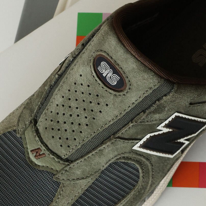 Top view of the shoe showing both SNS and NB logos.