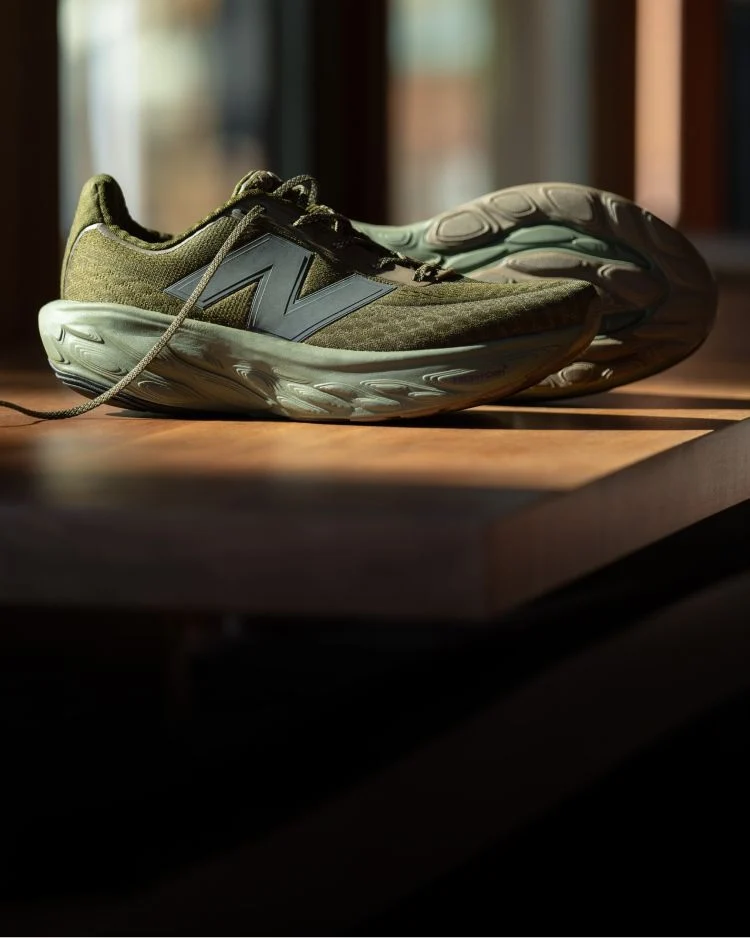 A pair of green 1080v14 shoes.
