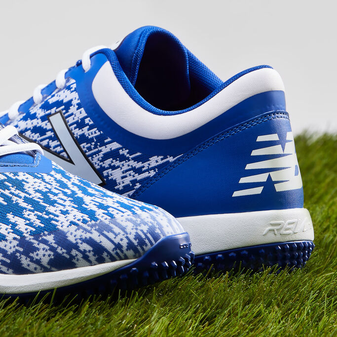 Close up view of front and back of the blue 4040v5 Turf sitting on grass