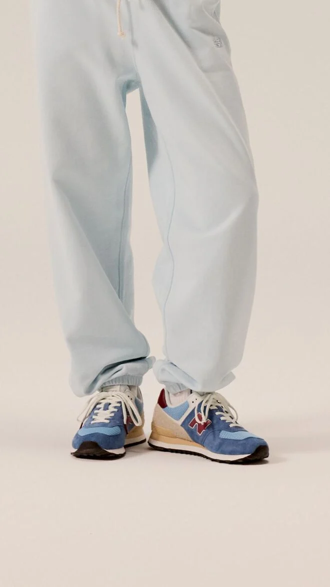 Person wearing 574 shoes.