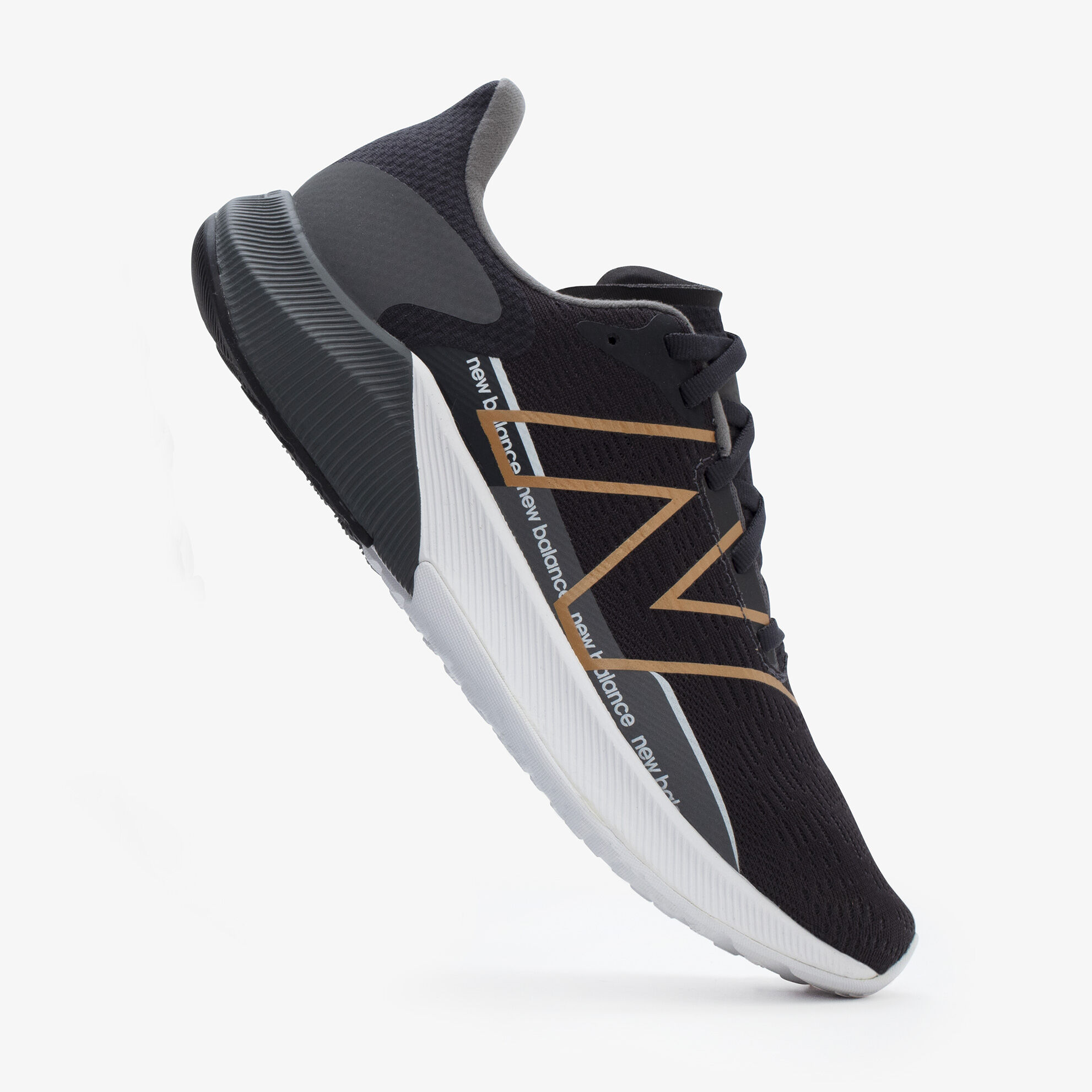 Side profile of black women’s FuelCell propel with sole of the matching pair showing behind it.