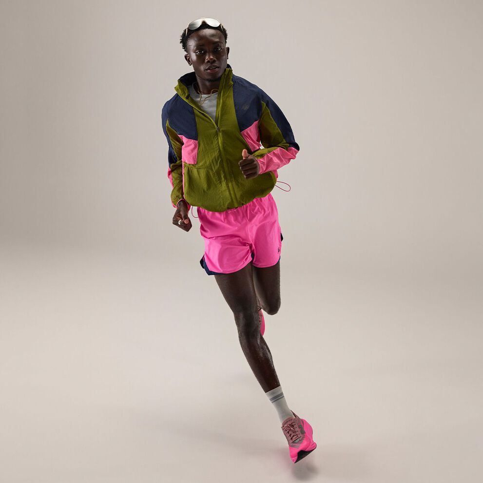 Tinoda Matsatsa running and wearing RC apparel. 