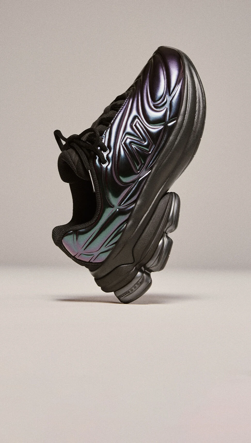 A metallic 5030 shoe in a studio