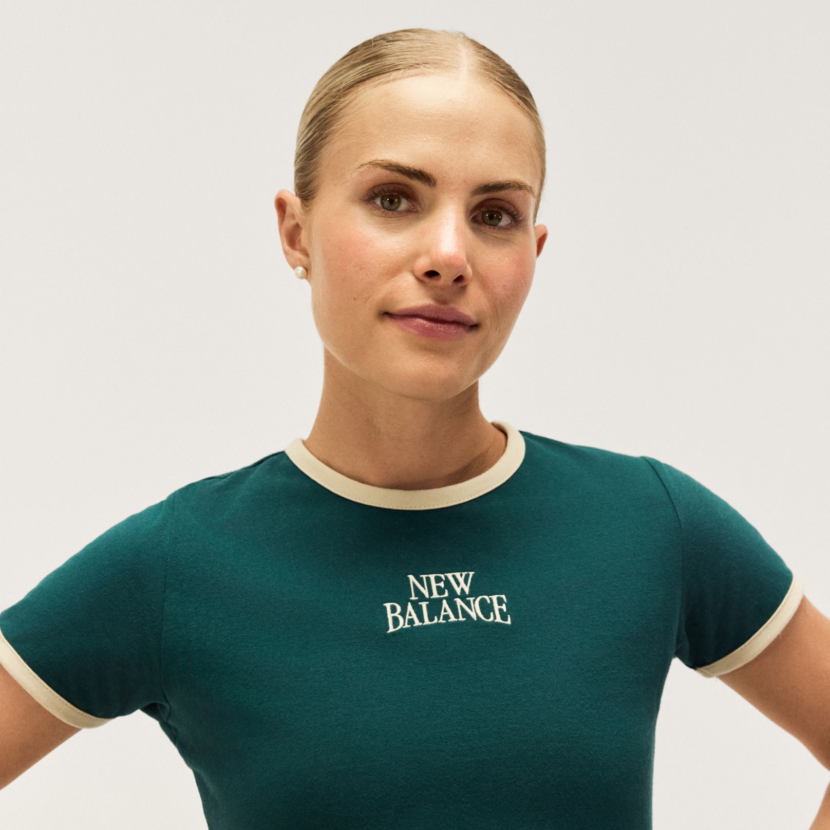 Parker Valby wearing trackside apparel in studio. 