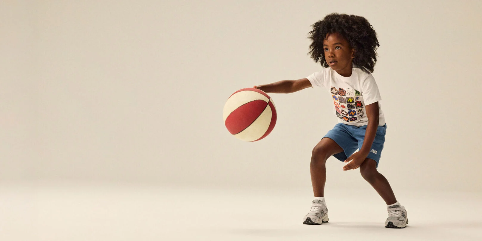 Boy wearing a pair of 2010 sneakers. 