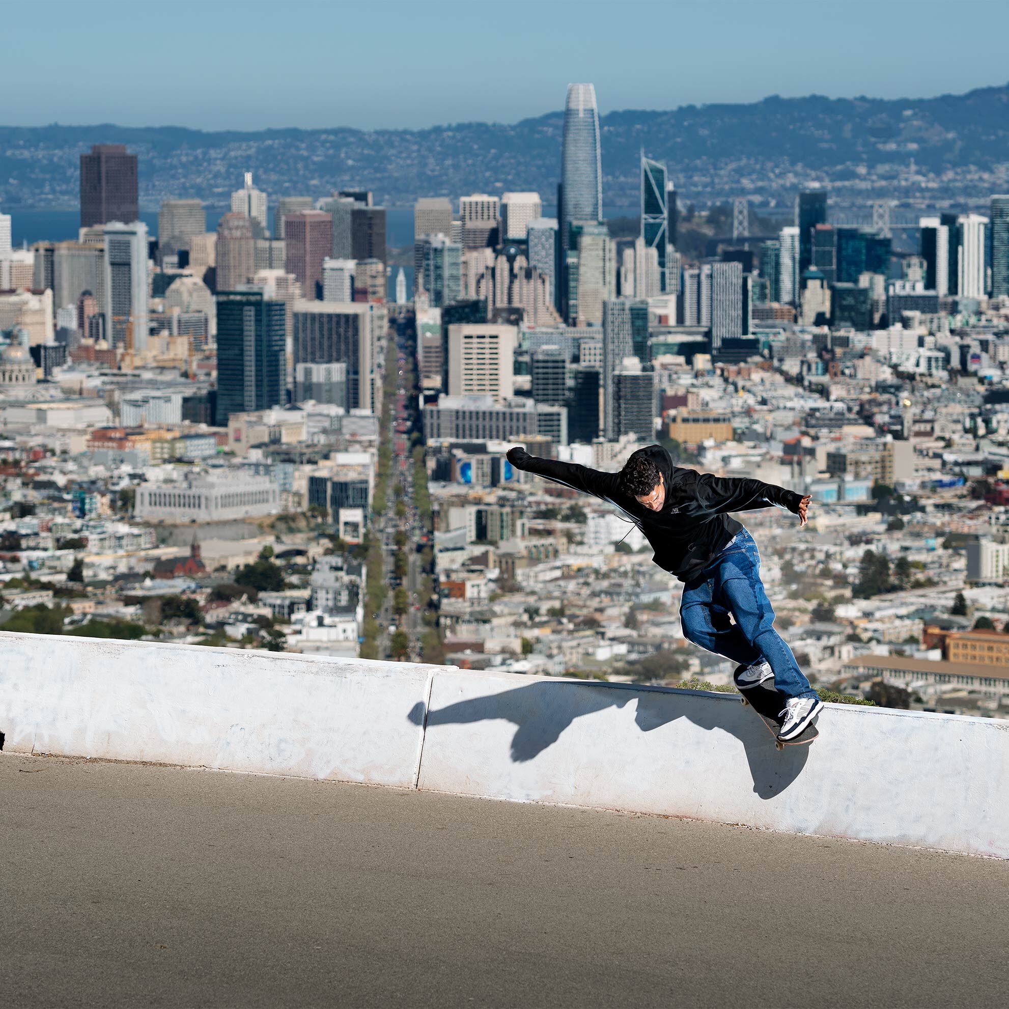 Tiago Lemos skateboarding on a guardrail wearing 808 Numeric shoes.