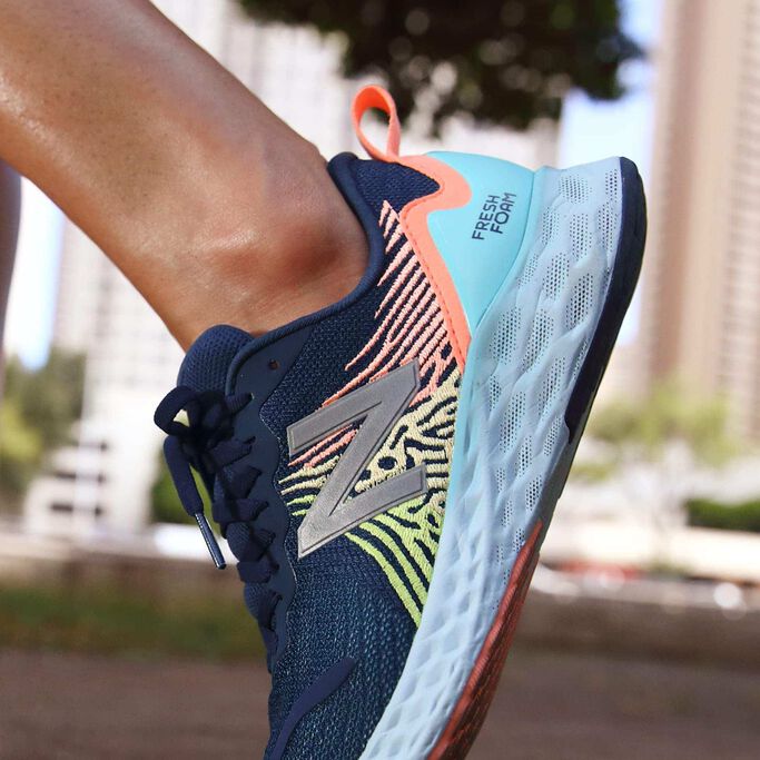 Close up of N logo on Fresh Foam Tempo on woman’s foot