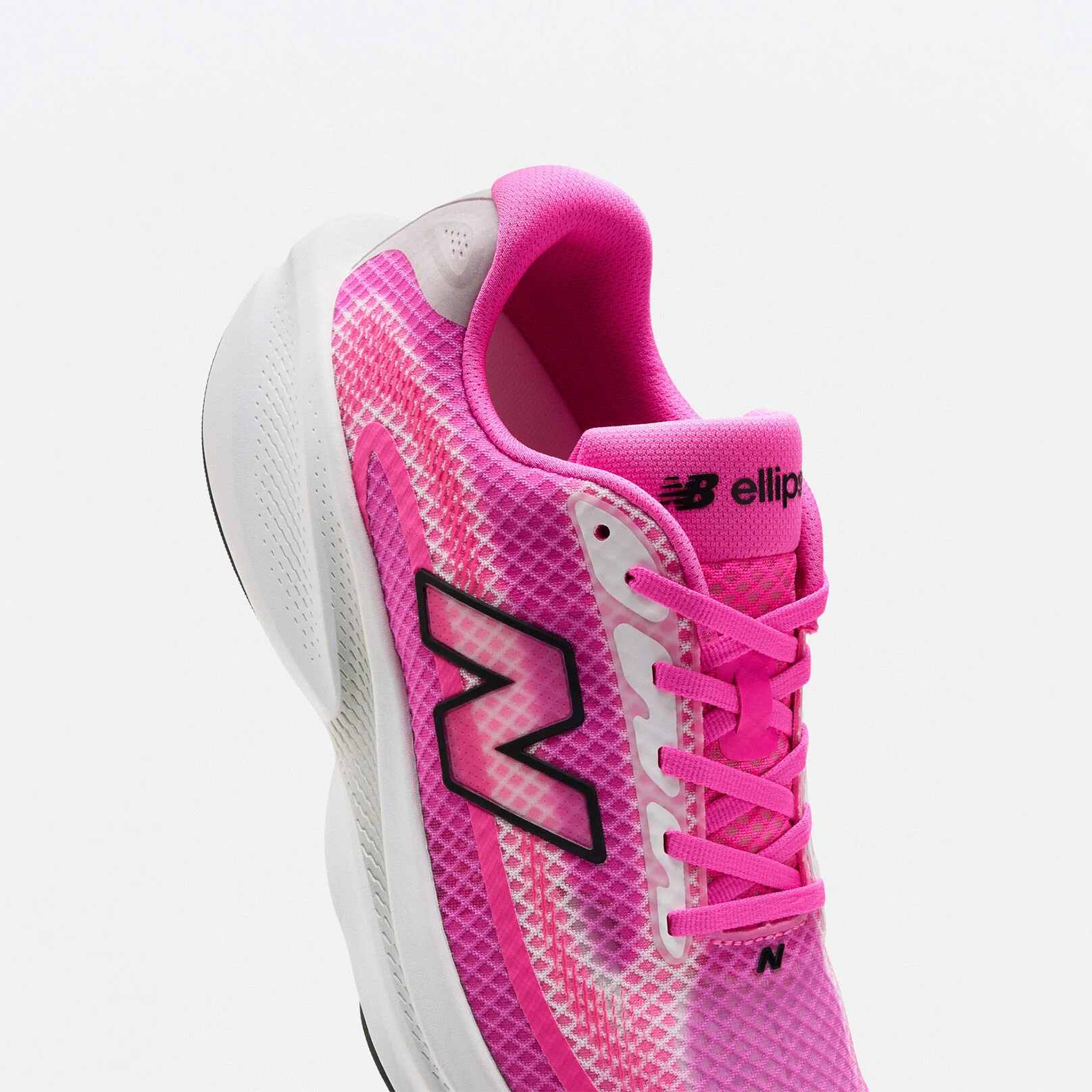 Single pink running shoe on a white background