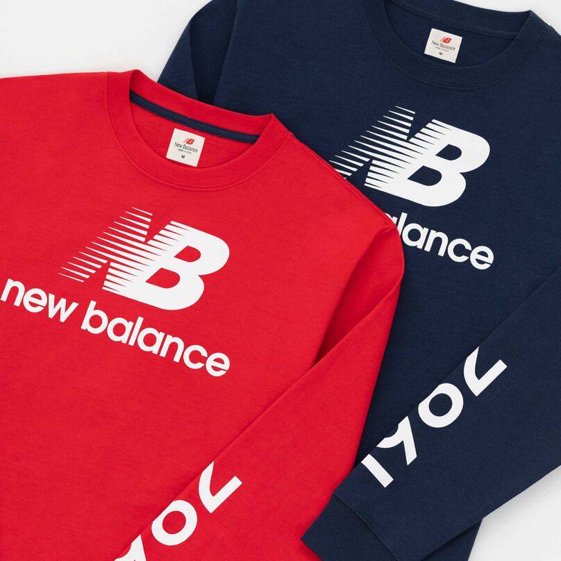 Red and navy MADE in USA long sleeve shirts laid on top of each other.
