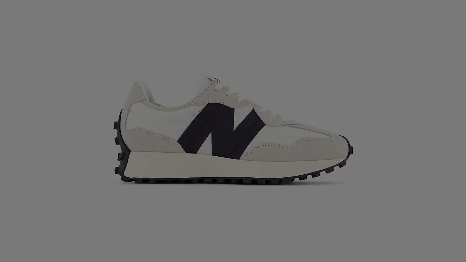 Off white and black New Balance 327.
