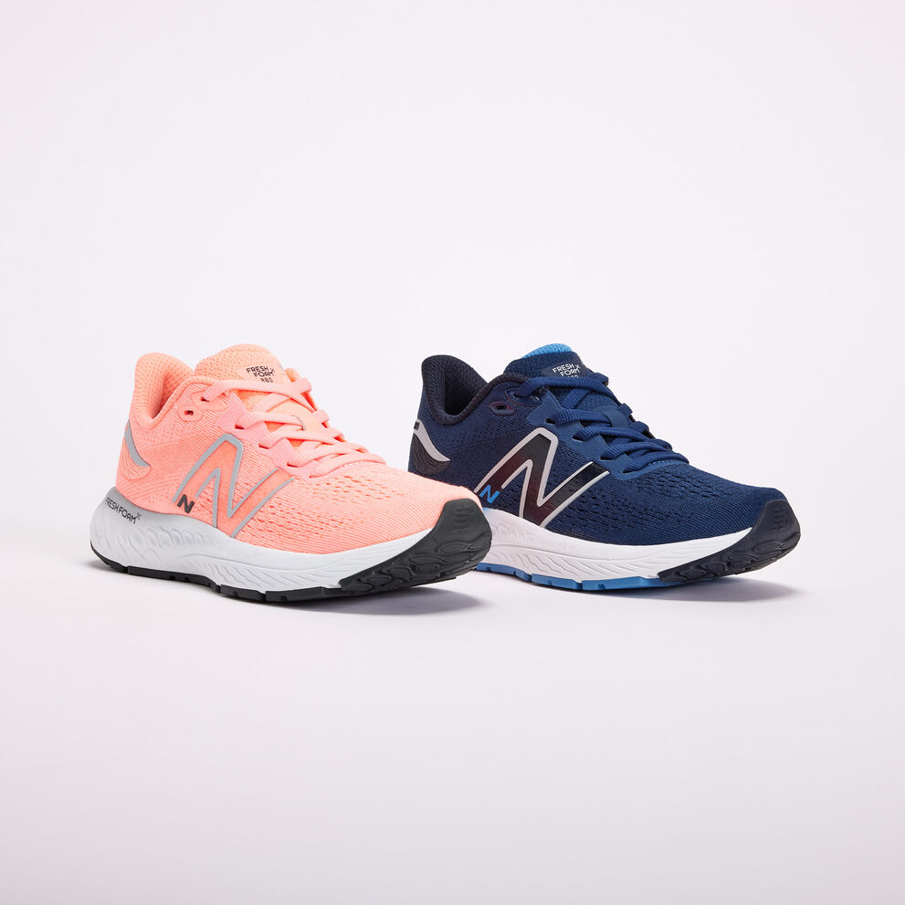 A pink and blue Kids’ 880 shoe  