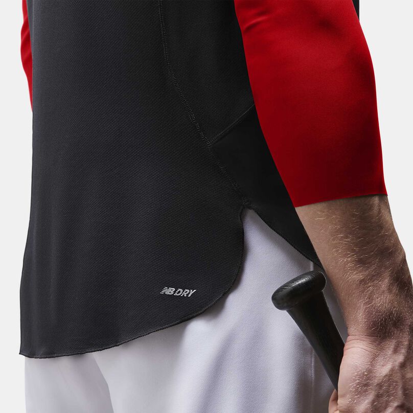 Back shot of a man showing seam of shirt.
