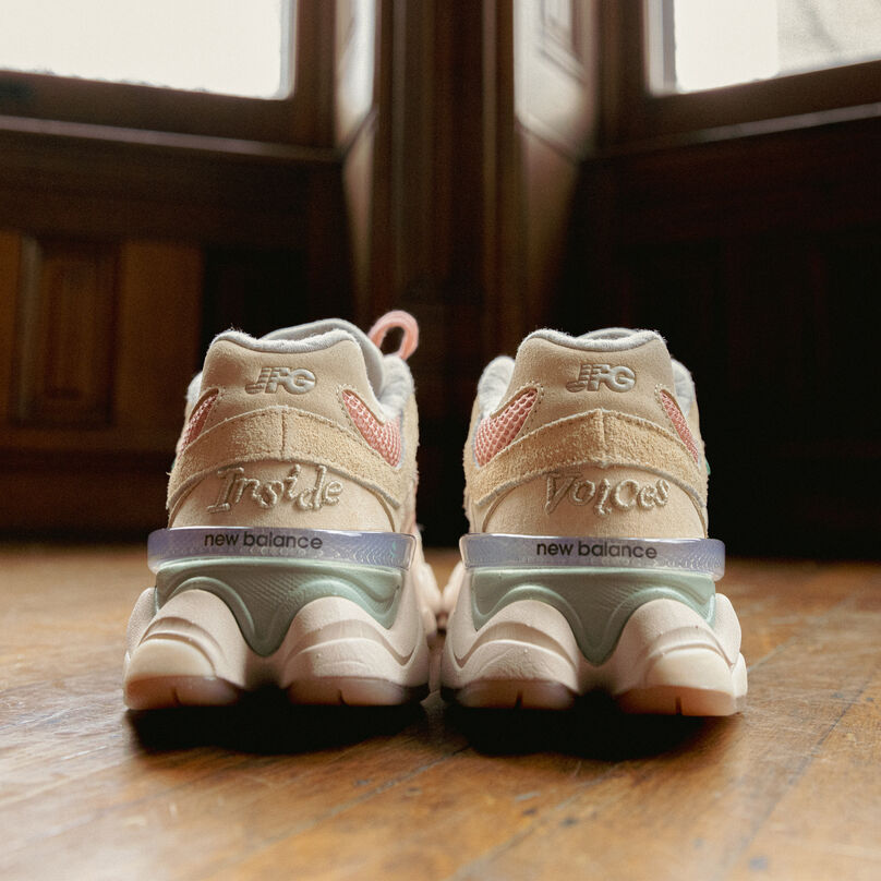 Heel view of light pink 9060 shoes