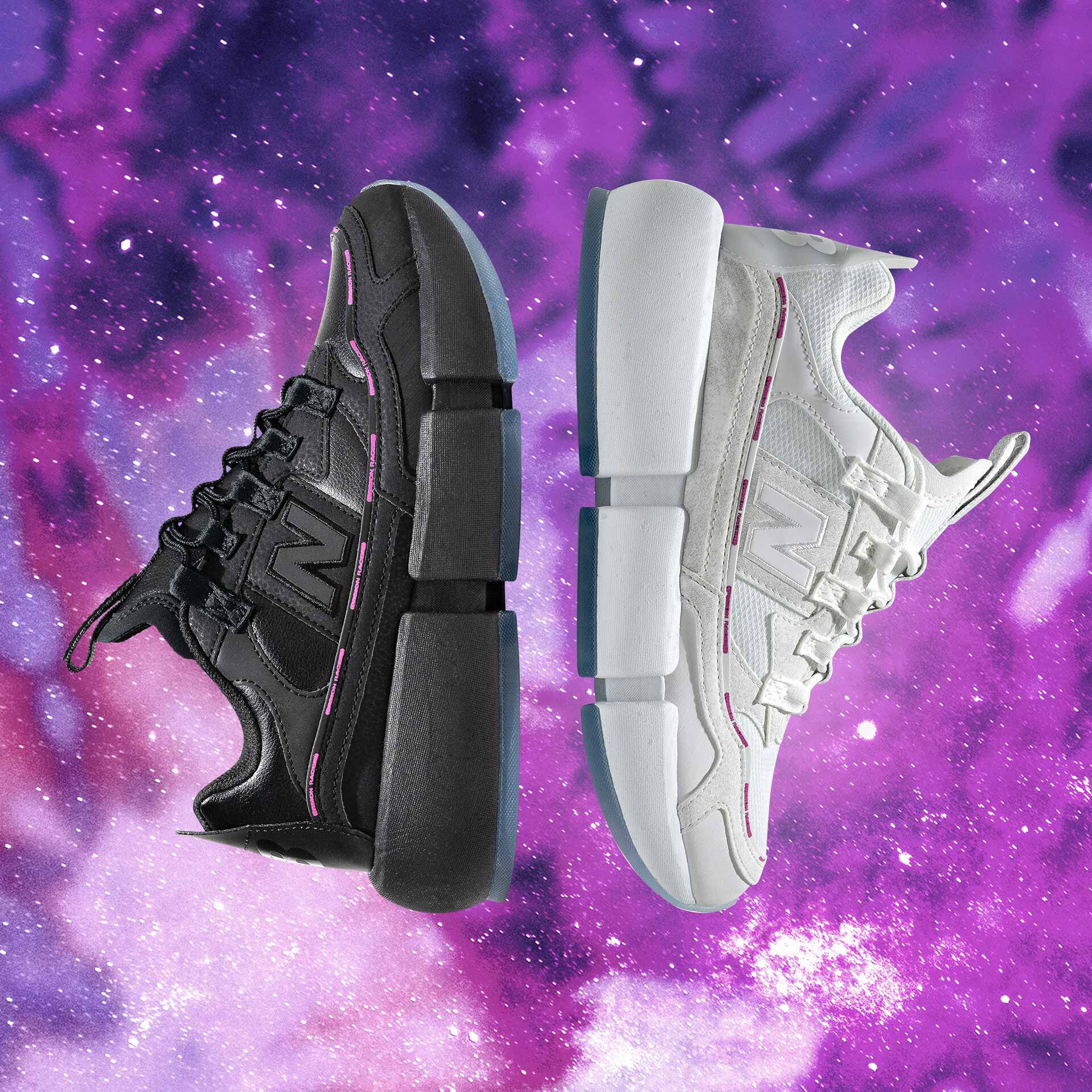 Black & white Vision Racer shoes floating against galaxy background.
