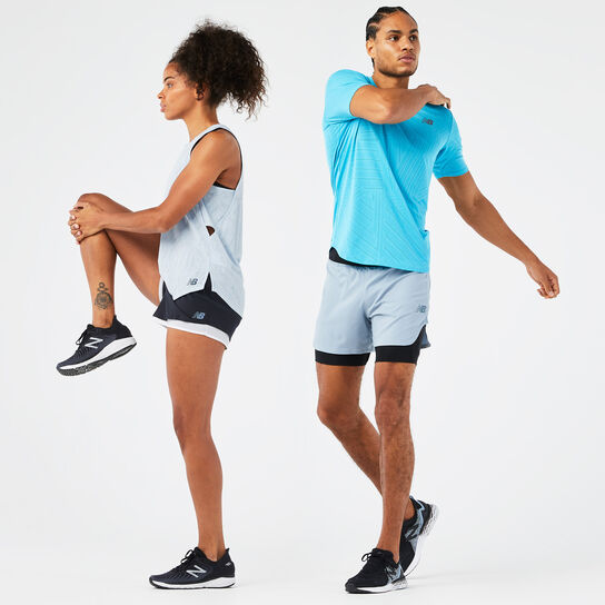 Young couple stretching before a run. 