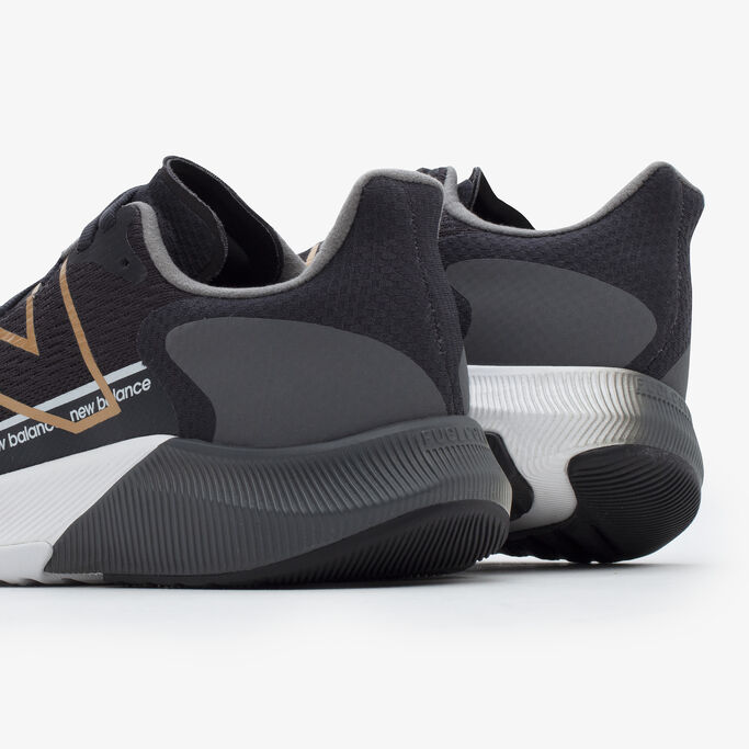 Back heel shot of a pair of the women’s black FuelCell Propel.