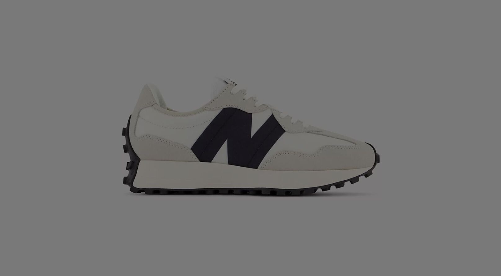 Off white and black New Balance 327. 