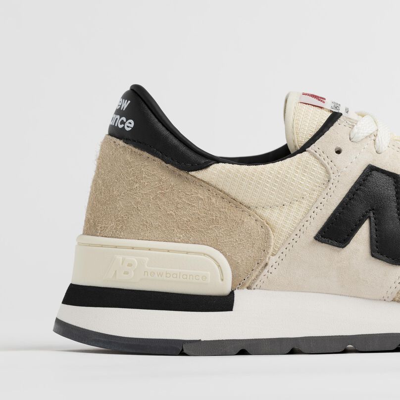 Side detail of the 990v1 heel and materials.