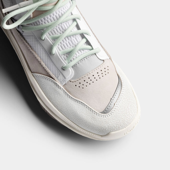 Neutral BB9000 basketball shoe detailing cracked leather texture