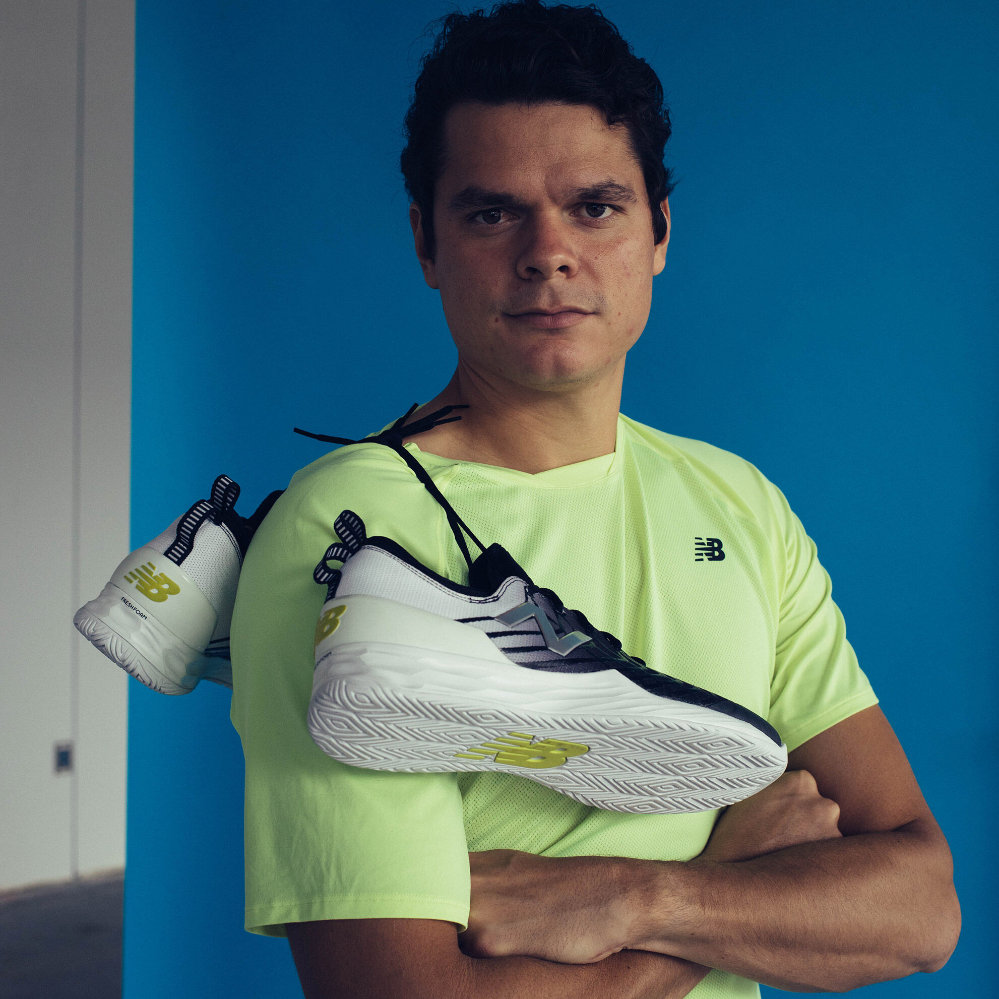 Milos Roanic in the studio with the Lav hanging on his shoulder.