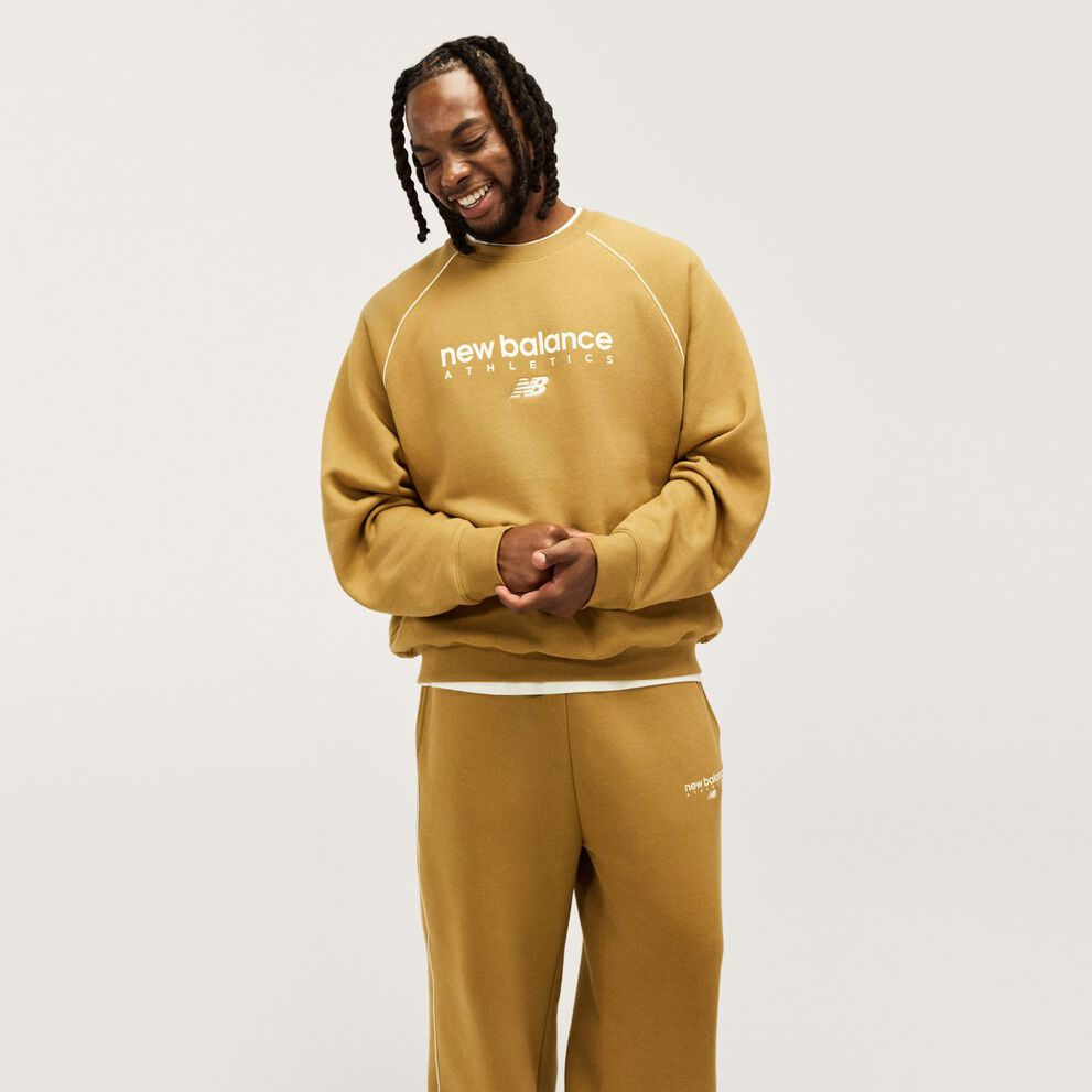 Darius Garland wearing trackside apparel in studio. 