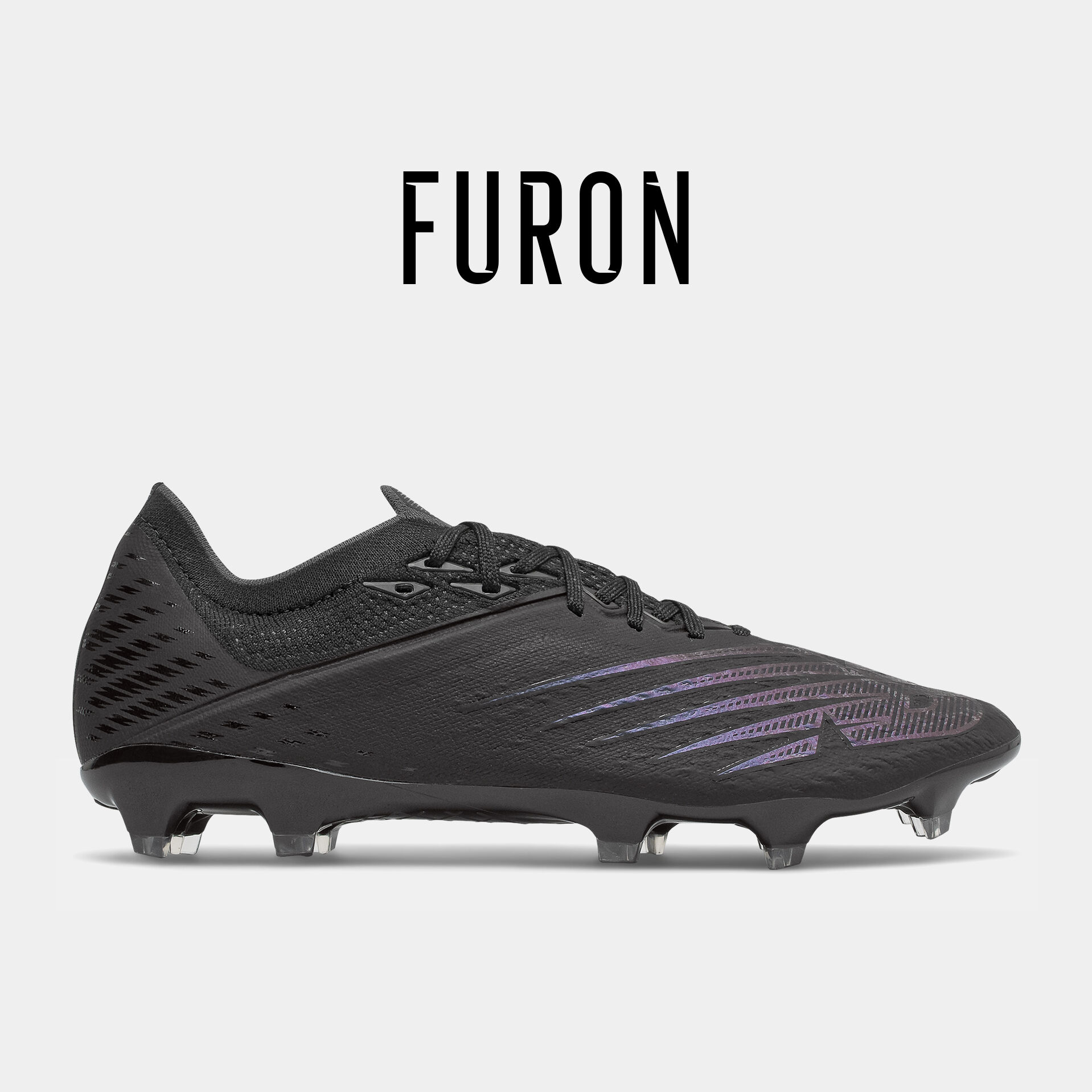 Chaussure de soccer à crampons noire.