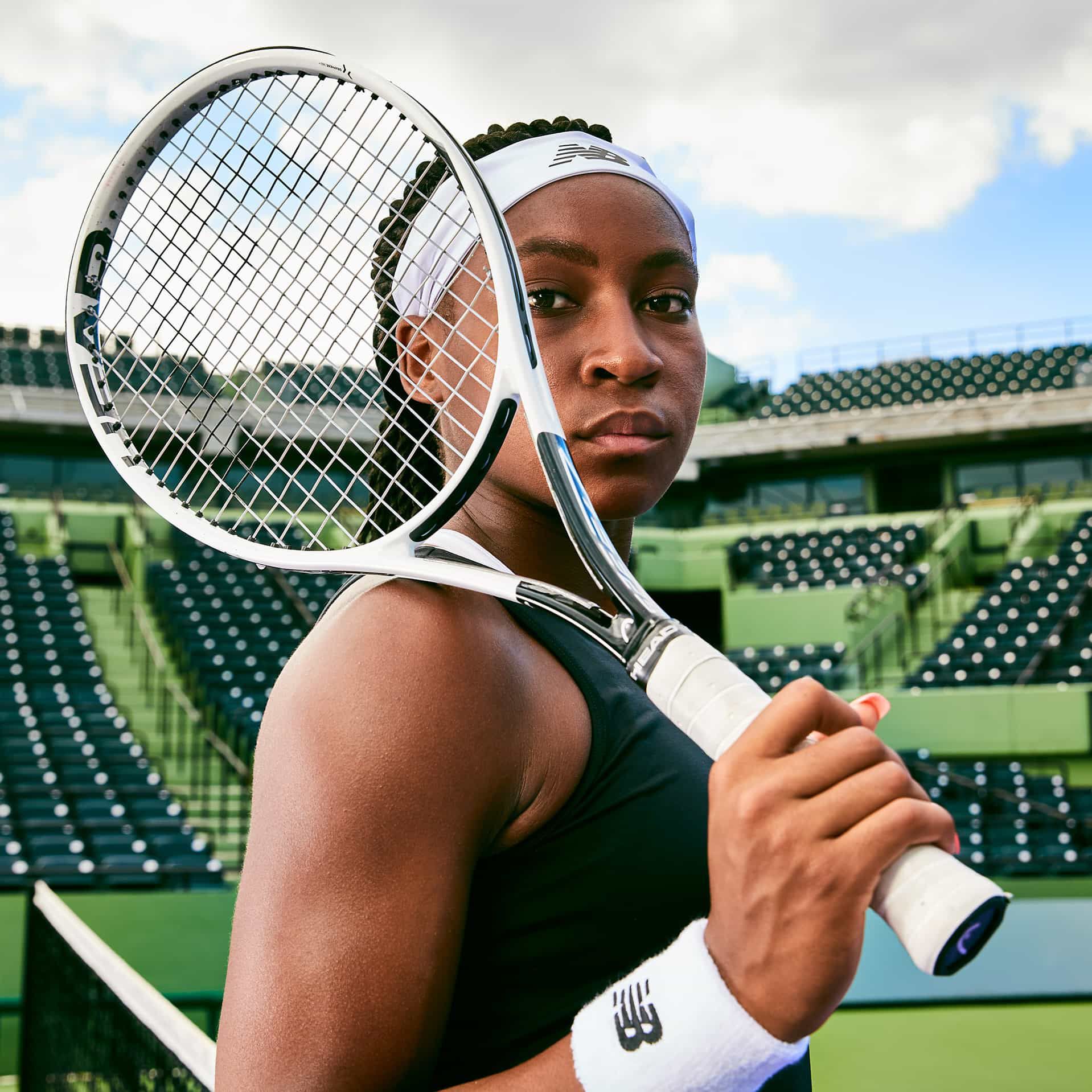 Coco Gauff holding tennis racket