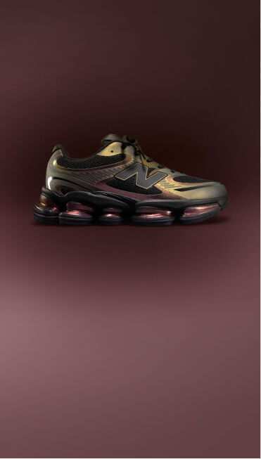 ABZORB 2000 shoes with a maroon background.