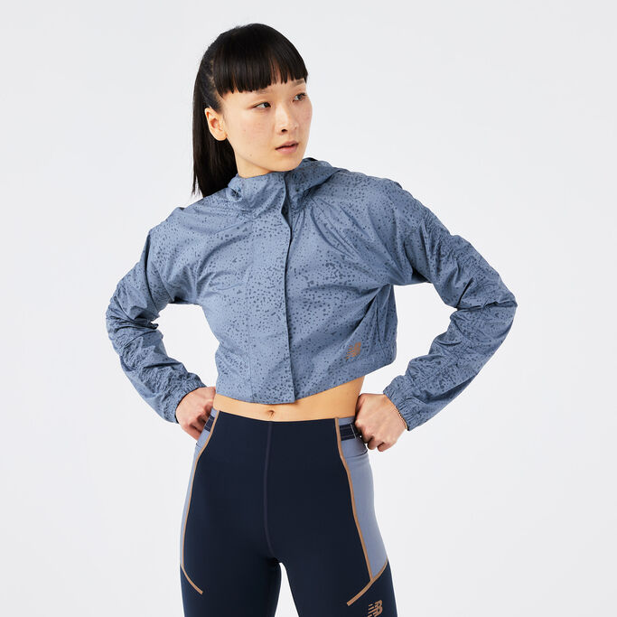 Lady with her arms on her hips showing the crop on the jacket.