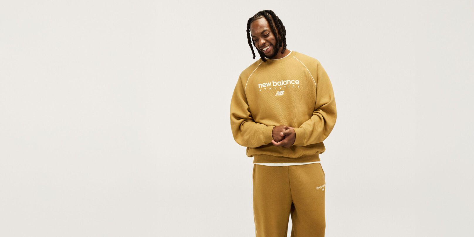 Darius Garland wearing trackside apparel in studio. 