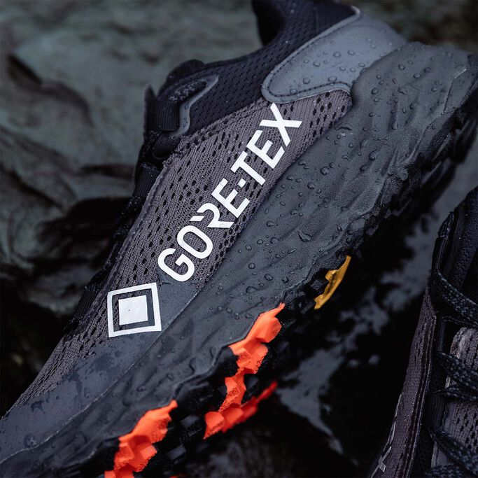 Detail of the medial side of the shoe with water drops