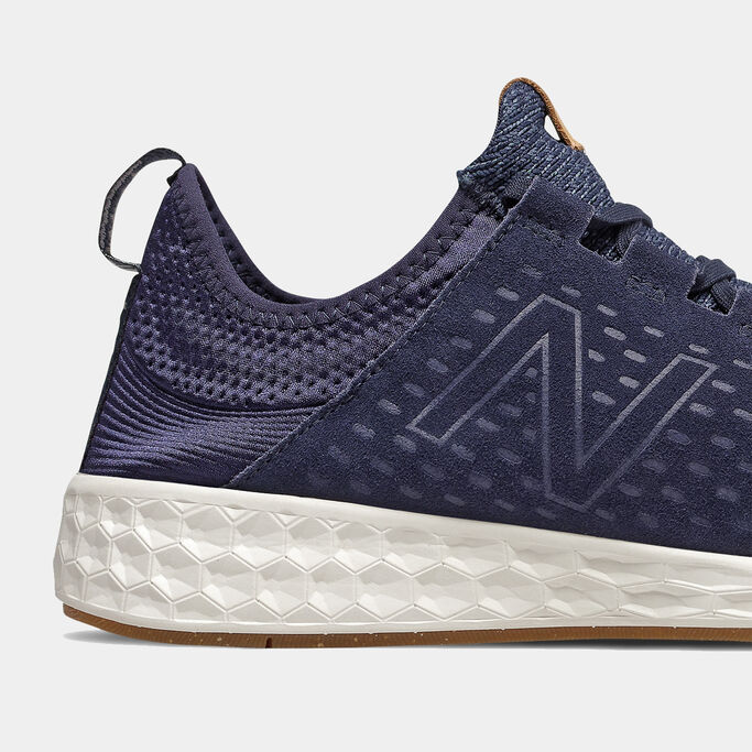 Close up side view of navy Fresh Foam Cruz v1