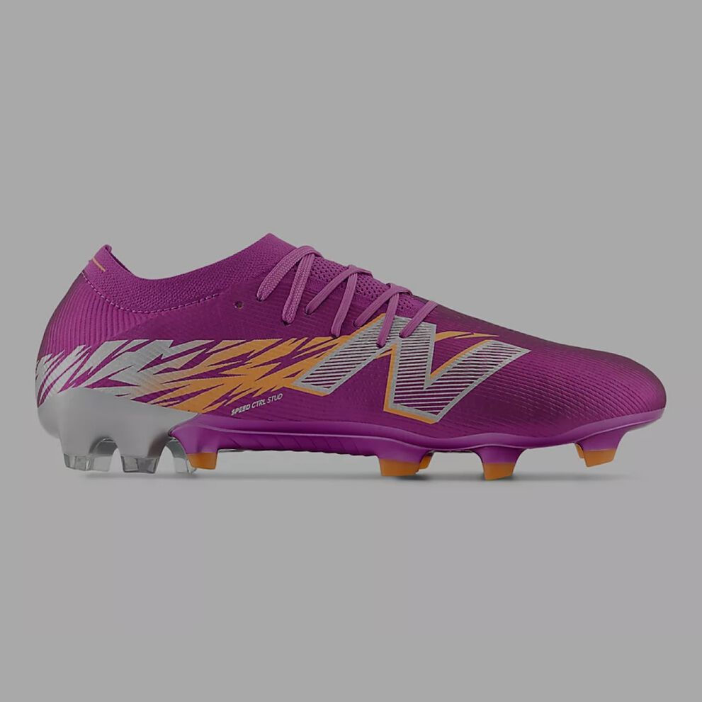 Purple soccer cleat with molded nubs. 
