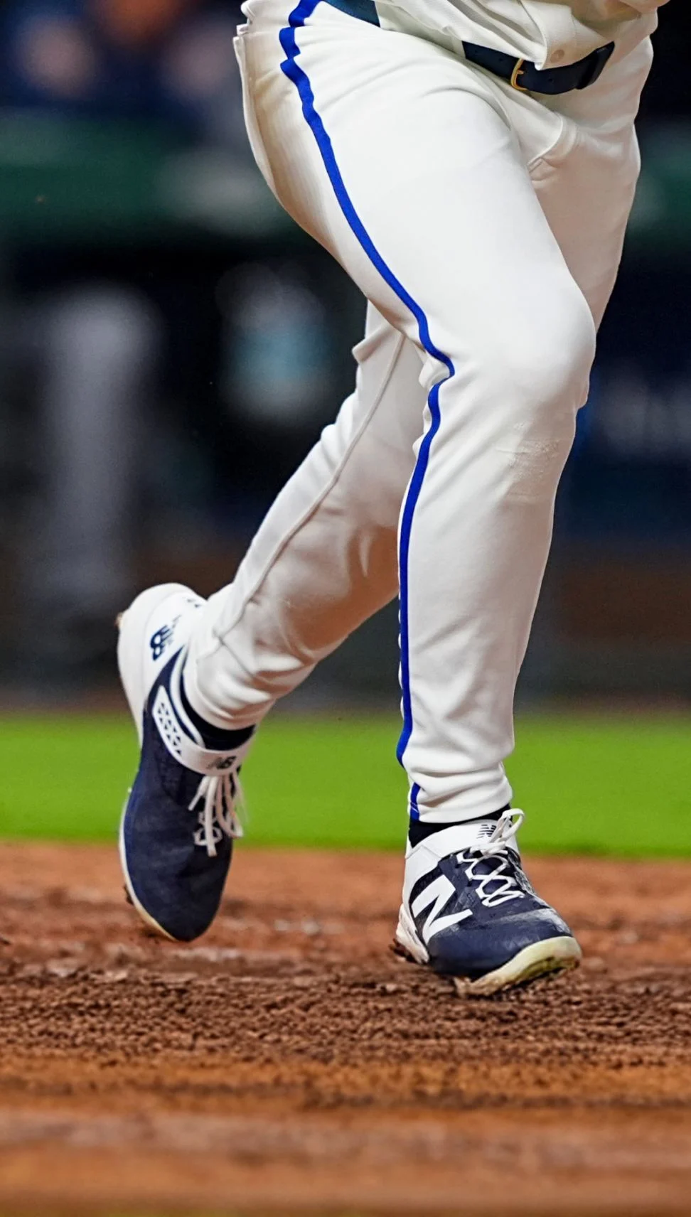 MLB athlete running the bases. 