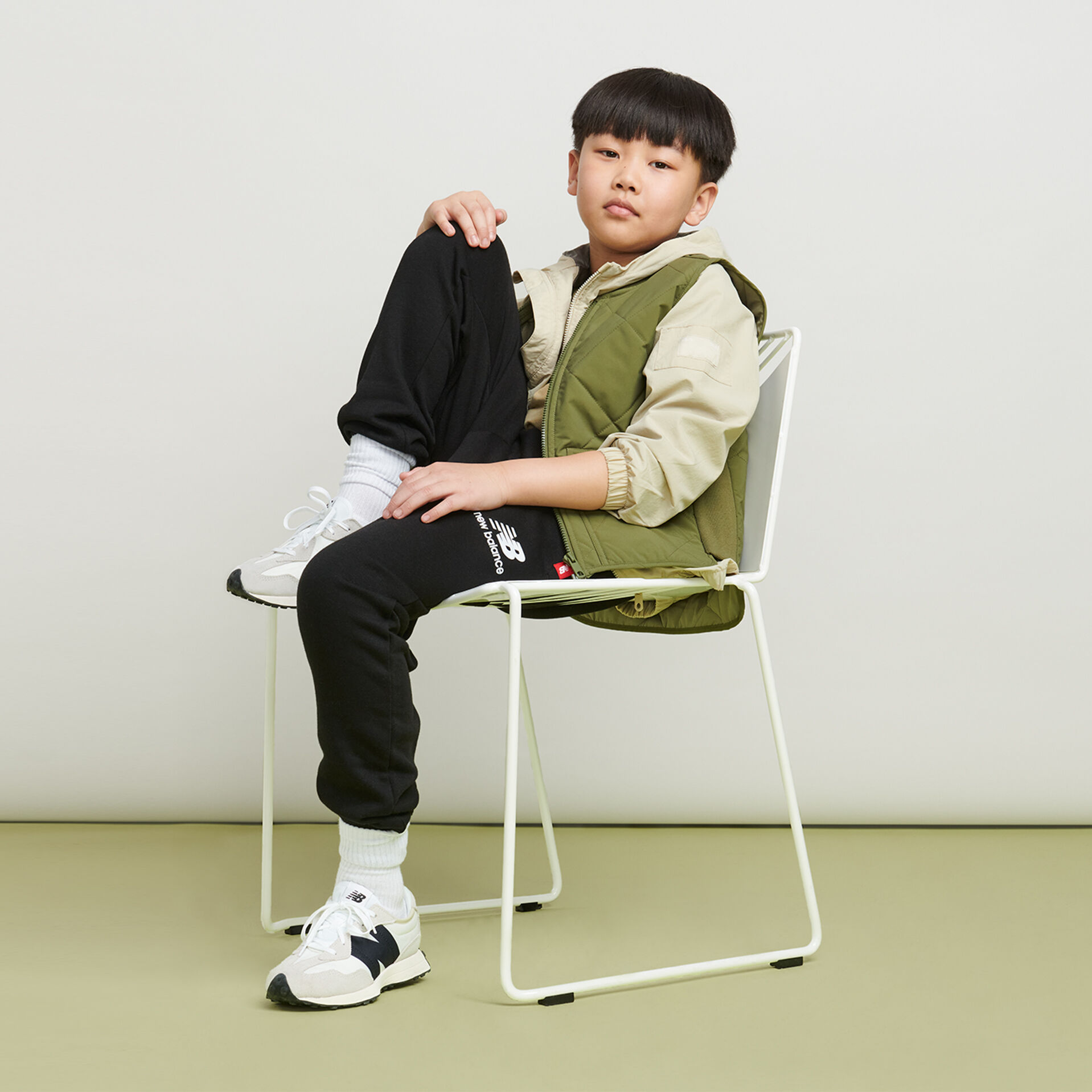 New balance sales kid sneakers