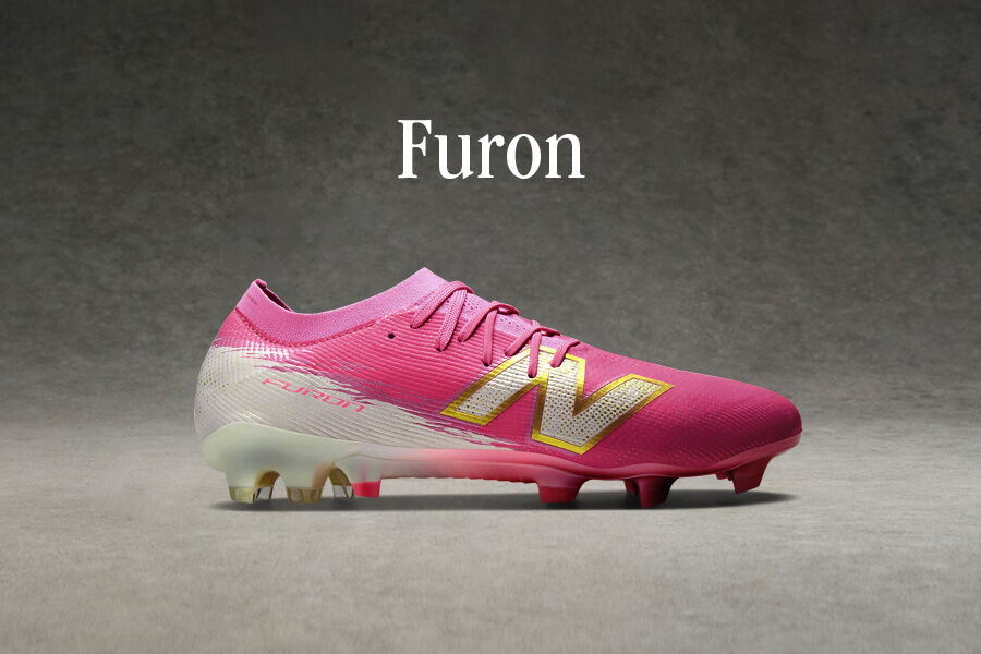 Side view of pink Furon soccer cleat.