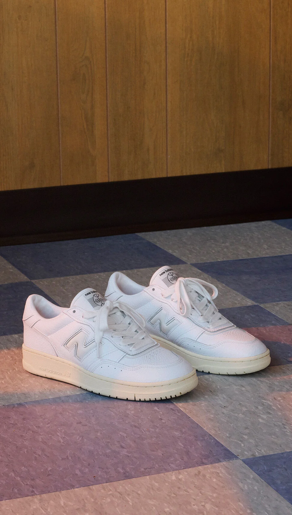 White pair of 950s on a tile floor