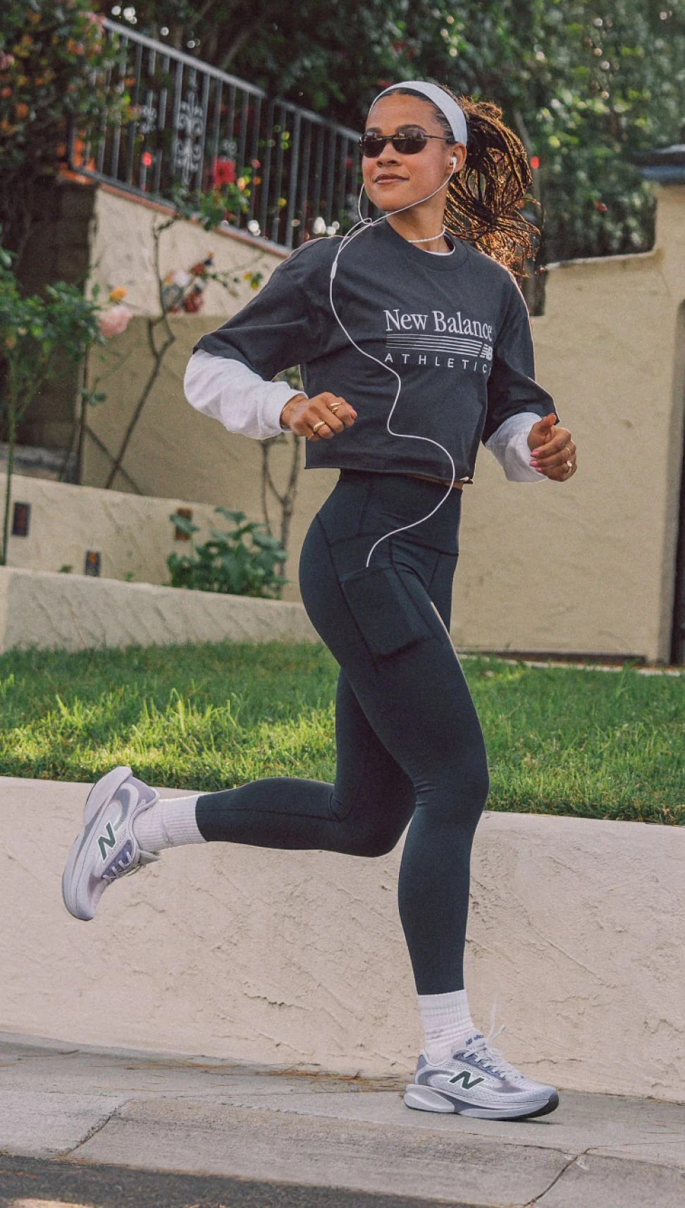 A person running outside wearing Ellipse shoes.